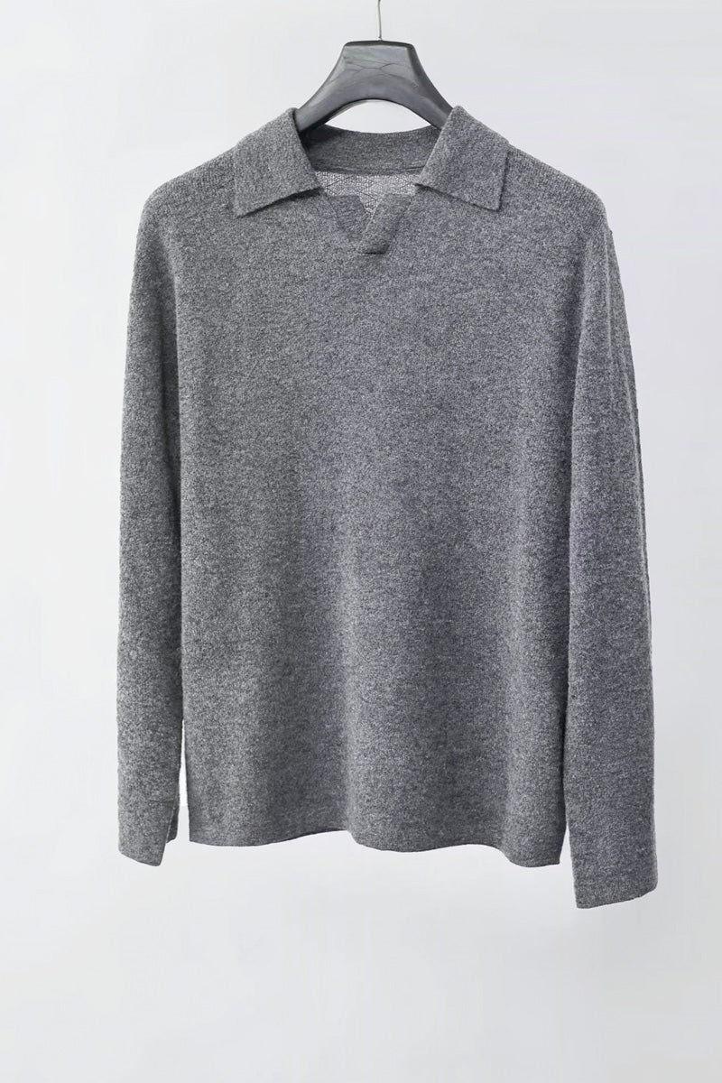Mayfairloom Silk-Core V-Neck Cashmere Sweater displayed on a hanger, showcasing its soft texture and elegant V-neck design.