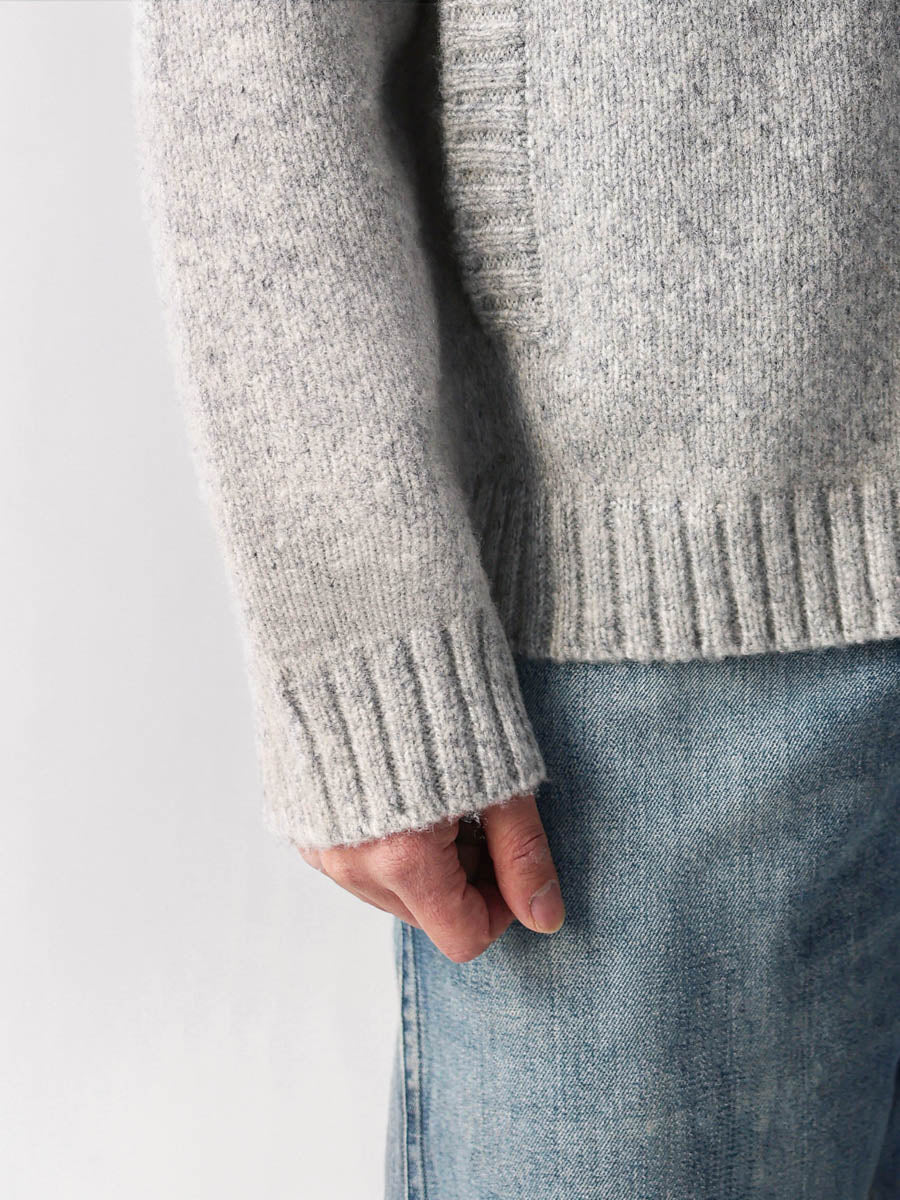 Mayfairloom Tasmania 740 Wool Jacket hanging on a wooden hanger, showcasing its tailored fit and textured fabric detail.