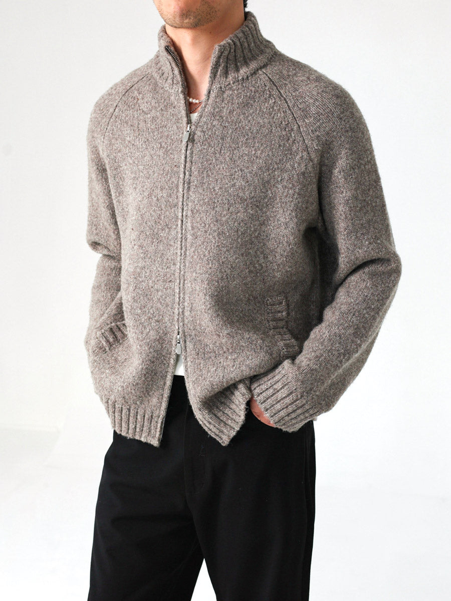 Mayfairloom Tasmania 740 wool jacket displayed on a hanger, showcasing its tailored design and rich fabric texture.