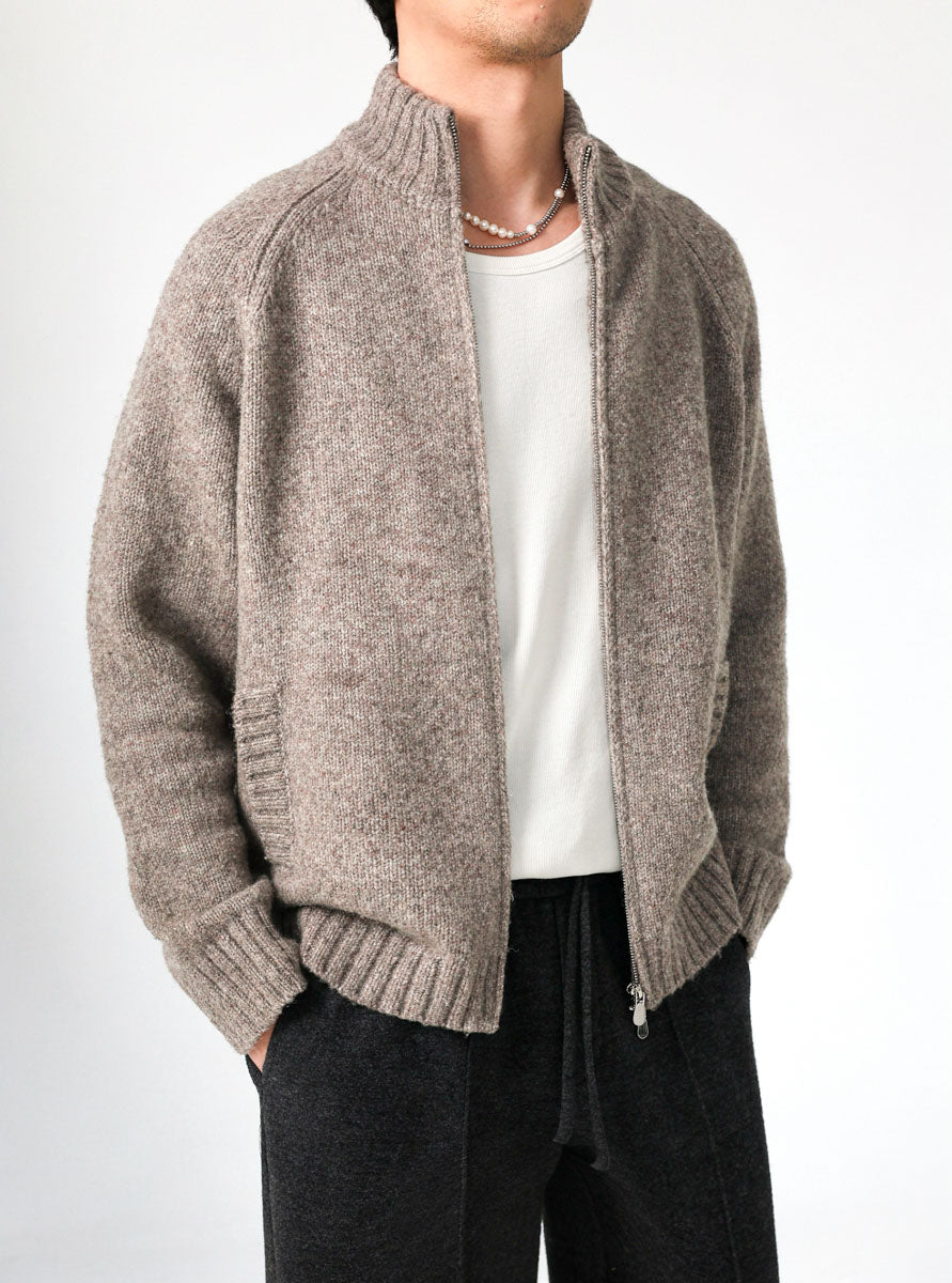 Mayfairloom Tasmania 740 Wool Jacket displayed hanging, showcasing its tailored fit and classic design in rich wool fabric.