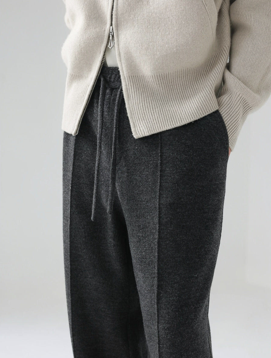 Mayfairloom minimalist wool trousers featuring a sleek, tailored design with a comfortable fit and classic style.