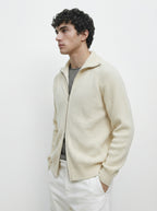 Mayfairloom modal high-neck knit cardigan displayed on a model, showcasing its cozy, stylish design in a natural setting.