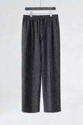 Mayfairloom minimalist wool pants featuring a sleek, tailored fit and neutral color, displayed on a mannequin.
