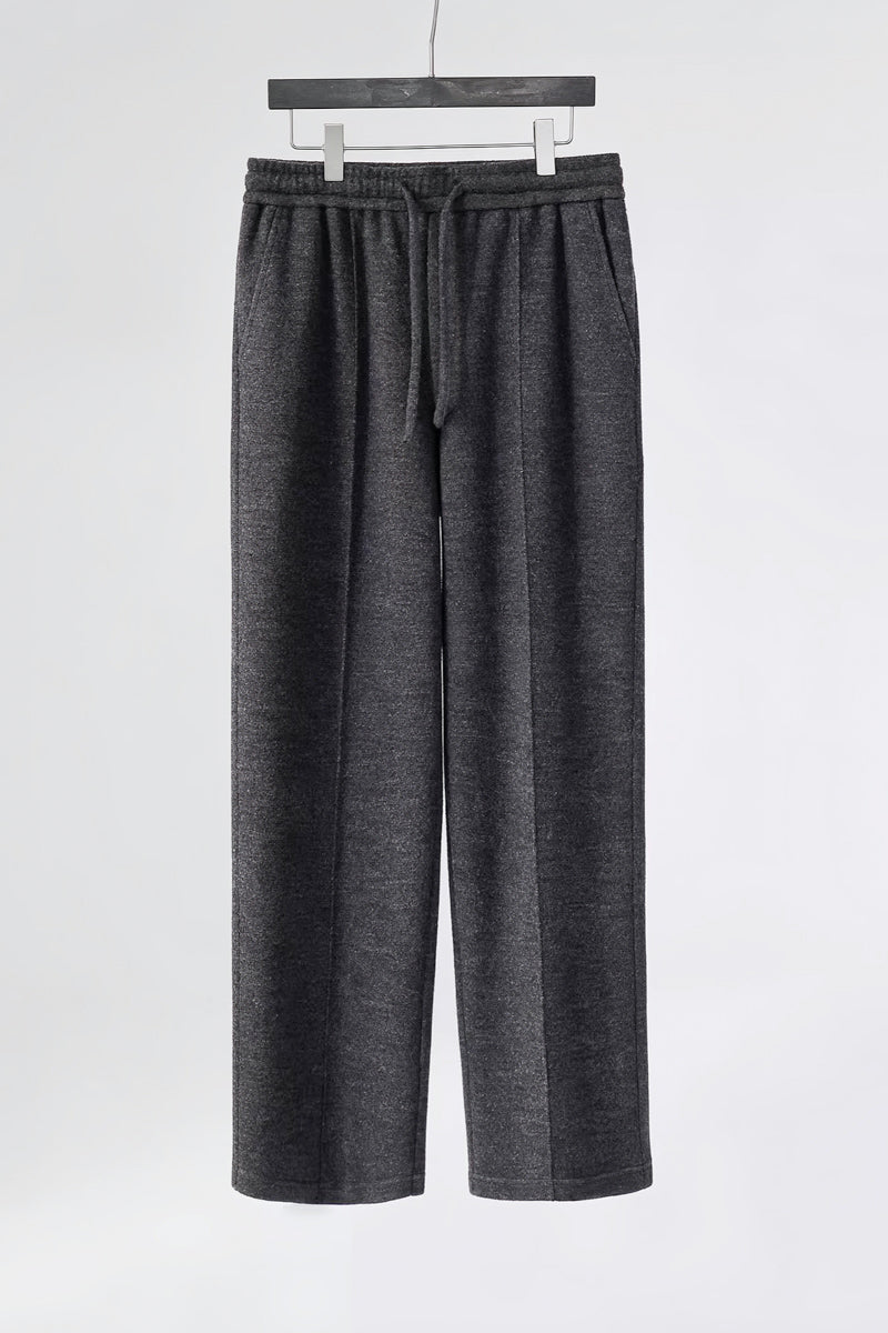 Mayfairloom minimalist wool pants featuring a sleek, tailored fit and neutral color, displayed on a mannequin.