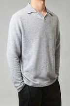Mayfairloom Silk-Core V-Neck Cashmere Sweater displayed on a hanger, showcasing its soft, luxurious fabric and classic V-neck design.