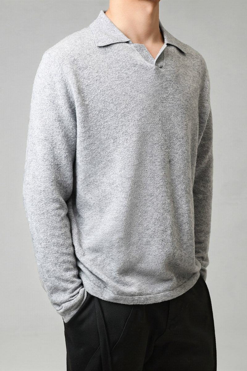 Mayfairloom Silk-Core V-Neck Cashmere Sweater displayed on a hanger, showcasing its soft, luxurious fabric and classic V-neck design.