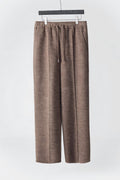 Mayfairloom minimalist wool pants shown on a model, featuring a sleek, effortless design with clean lines and a tailored fit.
