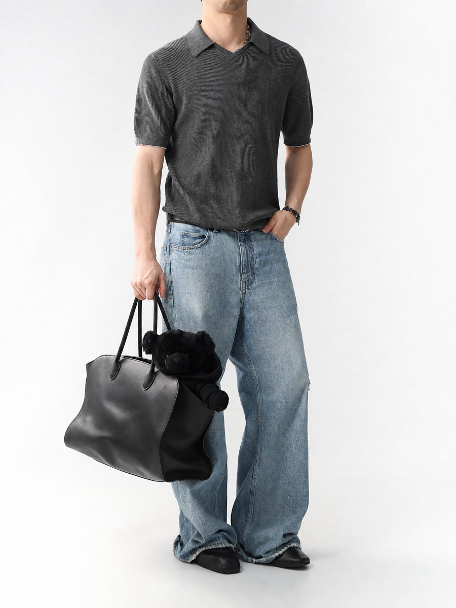 Mayfairloom Gullwing V-Neck Knit Polo displayed on a mannequin, featuring a classic V-neck design in soft knit fabric.
