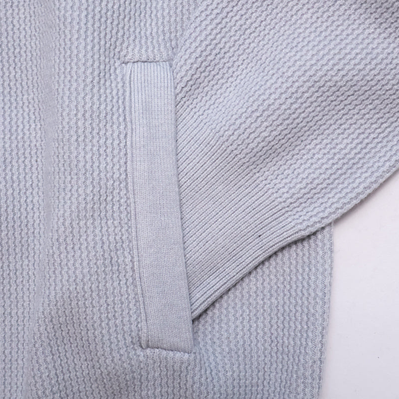 Light grey Marlow cardigan by MayfairLoom, featuring a soft knit fabric and classic button closure, styled on a hanger.