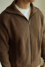 Mayfairloom modal high-neck knit cardigan displayed on a hanger, showcasing its soft fabric and stylish high neckline.