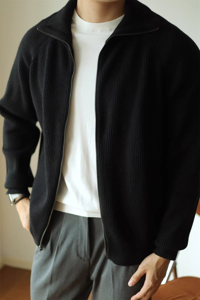 Mayfairloom modal high-neck knit cardigan displayed on a hanger, featuring a soft, ribbed texture and classic high neckline.