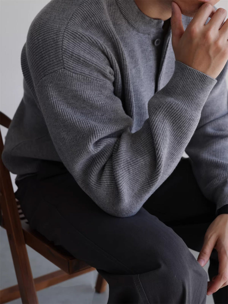 Mayfairloom Nomad Knit Henley Sweater in neutral tones, featuring a classic collar and textured knit fabric.