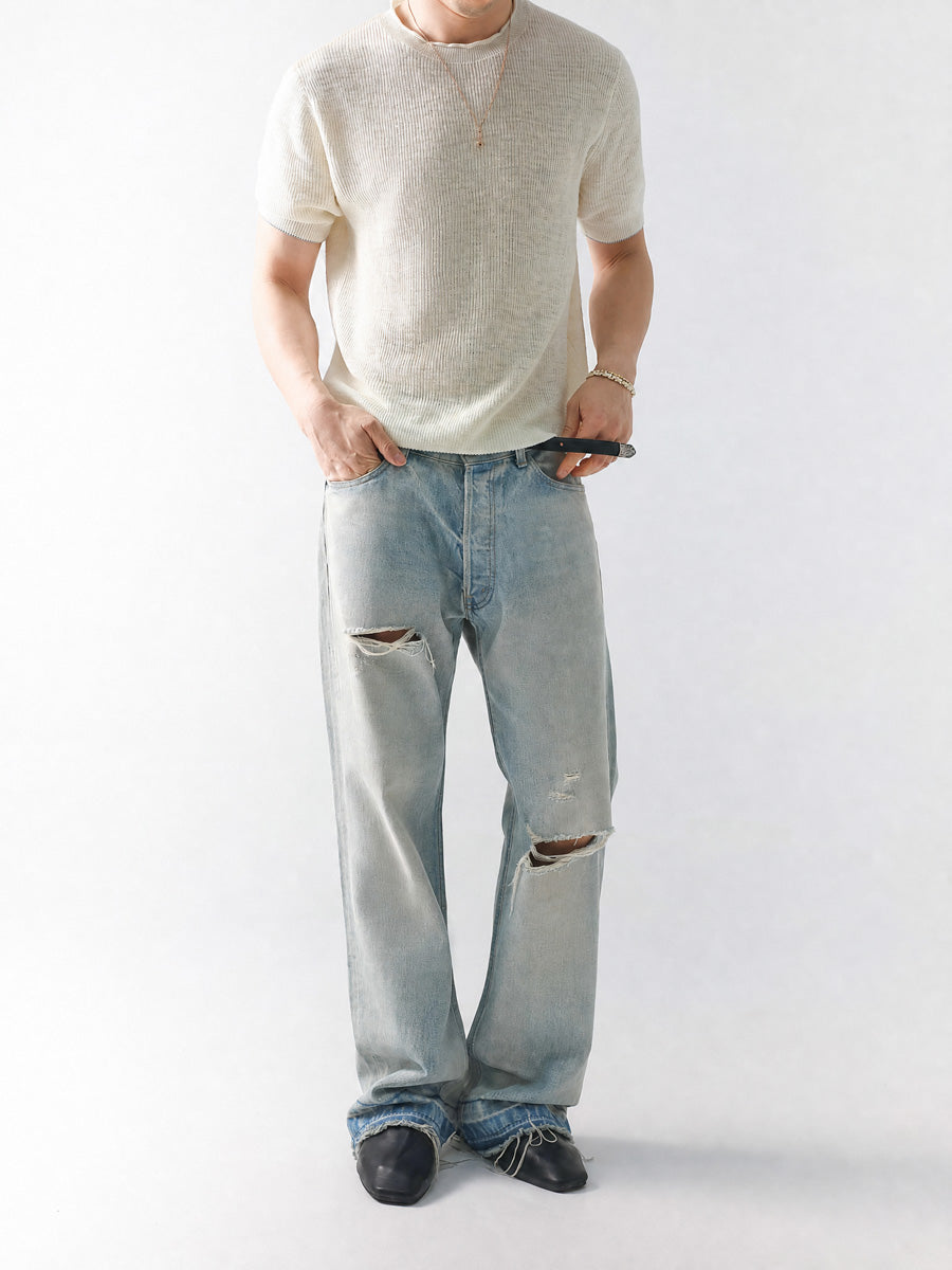 Mayfairloom Bruges Linen Knit Tee displayed on a hanger, showcasing its soft linen fabric and relaxed fit.