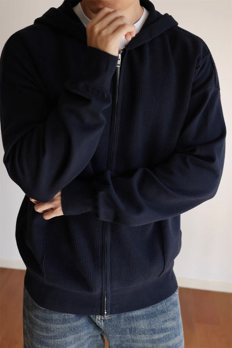 Mayfairloom Fragment Knit Hoodie Cardigan featuring a cozy, textured knit design with a hood and front pockets.