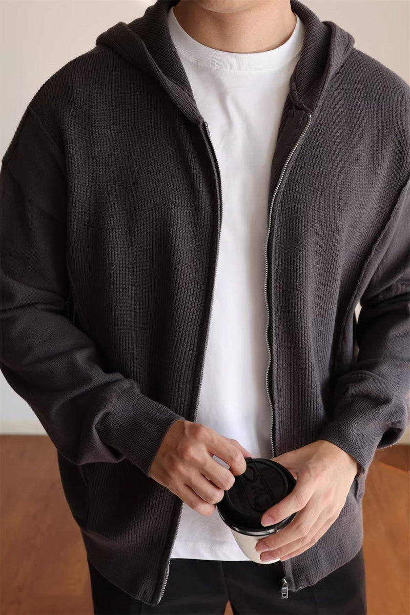 Mayfairloom Fragment Knit Hoodie Cardigan featuring a cozy, textured knit fabric and a relaxed fit with a hood and open front design.