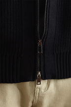 MayfairLoom Belvoir Aura ribbed cardigan in neutral color, featuring a classic fit and textured knit fabric.