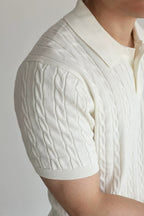 Mayfairloom Belmont Cable Polo shirt in navy, featuring cable knit pattern and classic collar, displayed flat on a white background.