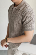 Mayfairloom Belmont Cable Polo shirt displayed on a hanger, featuring a classic collar and cable knit design.