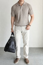 Mayfairloom Belmont Cable Polo shirt displayed on a hanger, featuring a classic cable-knit design and a collared neckline.