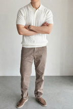 Mayfairloom Belmont Cable Polo shirt in navy, featuring a classic cable knit pattern and a collared neckline.