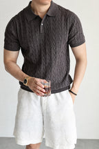 Mayfairloom Belmont Cable Polo shirt in navy, featuring cable knit pattern and classic collar, laid flat for display.