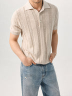 Mayfairloom Parthenon Hemp Knit Polo shirt displayed on a hanger, showcasing its textured hemp fabric and classic polo design.