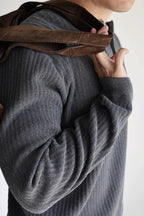 Mayfairloom double-twist cotton ribbed Henley sweater displayed on a model, featuring a classic collar and textured knit fabric.