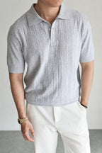 Mayfairloom Marlow Knit Polo shirt in navy, featuring a classic polo collar and textured knit fabric on a model.