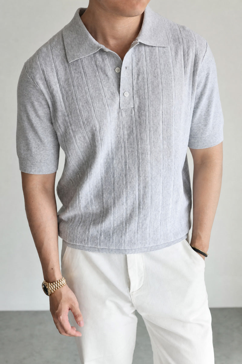 Mayfairloom Marlow Knit Polo shirt in navy, featuring a classic polo collar and textured knit fabric on a model.